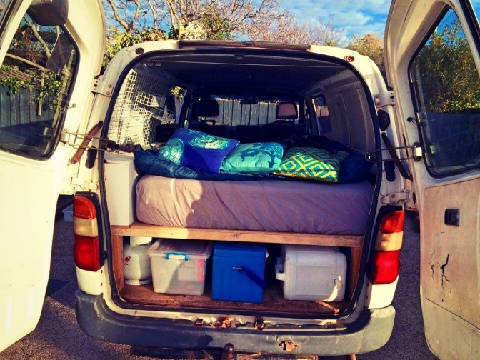 Rear view of packed campervan