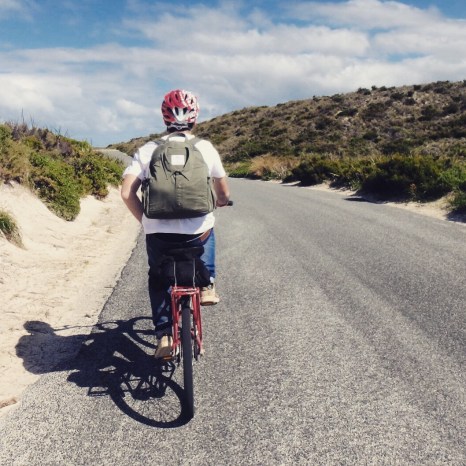 Gareth on bike with backpack, Rottnest Island, Western Australia