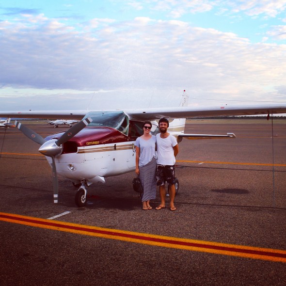 Couple in front of plane, Kununurra, Western Australia