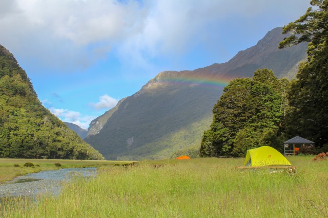 Meadow campsite with rainbow, Routeburn Track